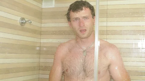 Man in shower 库存影片 29667804