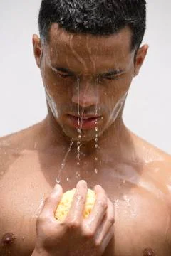 Man in shower Stock Photos
