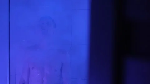 A man in the shower, reflecting on his problems after an emotionally exhausting Stock Footage 304236213