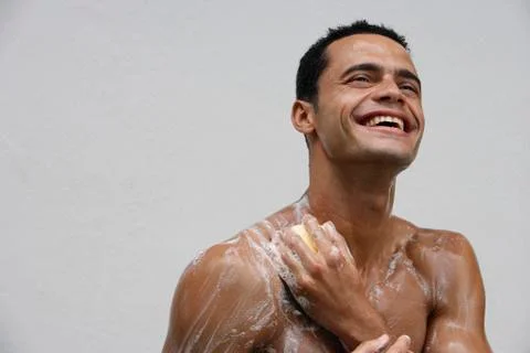 Man showering Stock Photos