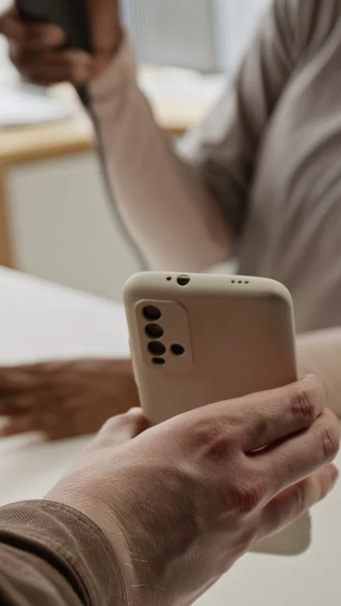 Man Showing Barcode on Smartphone to Black Woman Scanning Order Stock Footage 342605104