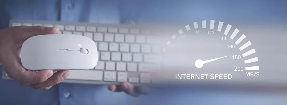 Man showing computer keyboard and mouse. Speedometer. Internet speed Stock Photos