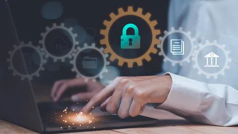 A man showing data access protection with key icon,Protecting data from the.. Stock Photos