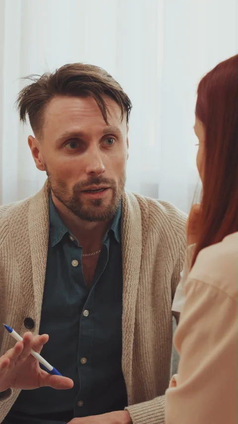 Man showing empathy and understanding in conversation Видео 330664418