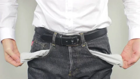 A Man showing empty pockets Stock Footage 233442084