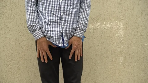 Man showing the empty pockets, poor jobless homeless and moneyless concept Stock Footage 114311196