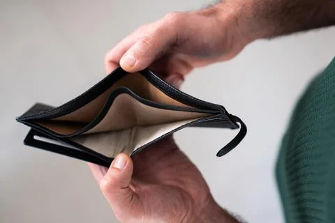 Man showing empty wallet Stock Photos