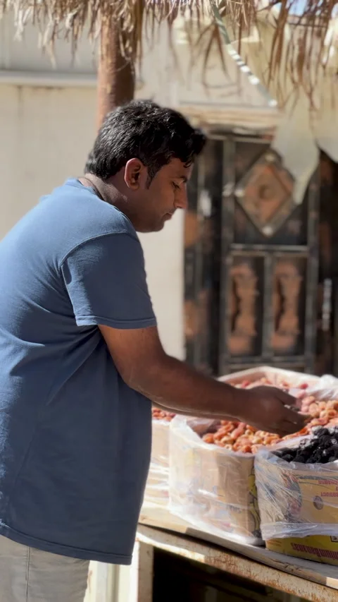 Man Showing Fresh Dates at The Garden Stock Footage 339034783
