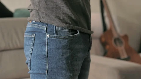 Man showing his empty pockets.Profile of sad musician turning out empty pockets. Stock Footage 127511343