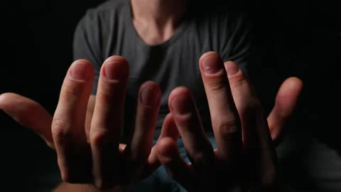 Man Showing His Fingernails and Cuticles Close Up Against Dark Background Stock Footage 339366237