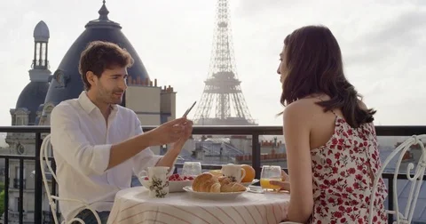 Man showing idea on digital tablet Young tourist couple in Paris hotel enjoying Stock Footage 73348952