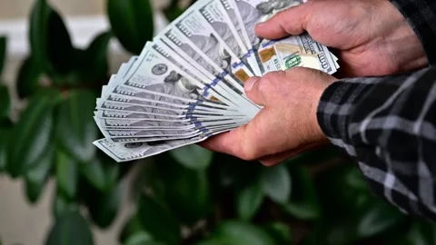 Man Showing Large Stack of Hundred Dollar Bills, Close Up Cash Money Stock Footage 346058410