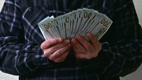 Man Showing Large Stack of Hundred Dollar Bills, Close Up Cash Money Stock Footage 346058496