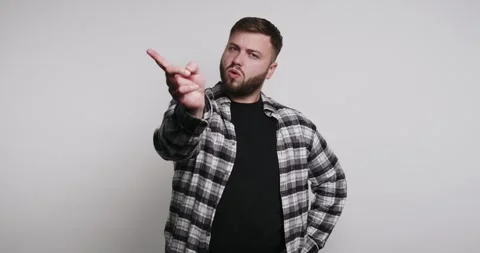Man showing no gesture with his finger on a white background Stock Footage 326797989