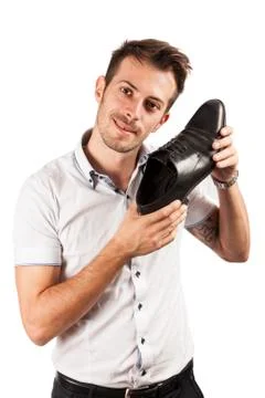 Man showing one shoe Stock Photos