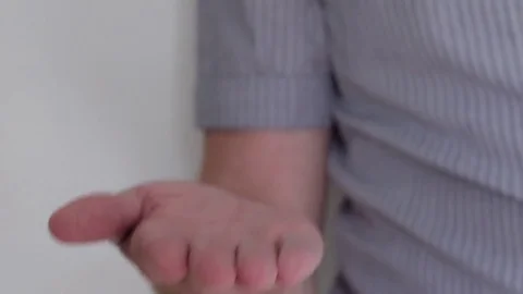 Man showing open palm, presentation concept. 스톡 동영상 79024627