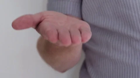 Man showing open palm, presentation concept. Stock-Footage 79025290
