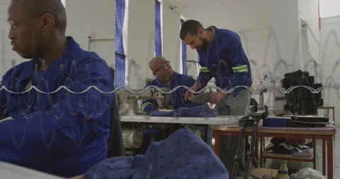 Man showing pattern, operator adjusting fabric for fit in garment shop, animated 스톡 동영상 330547031