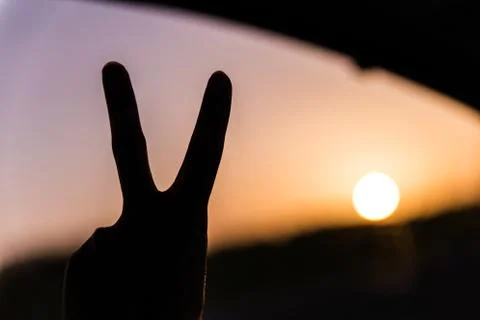 Man showing the peace sign Stock Photos