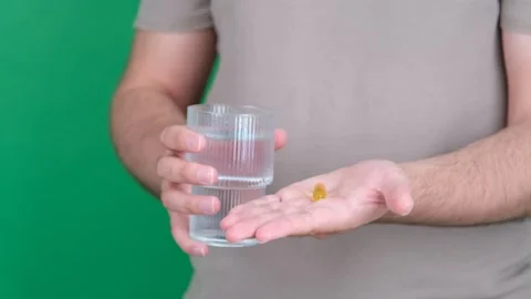 Man showing pill Stock Footage 278985170