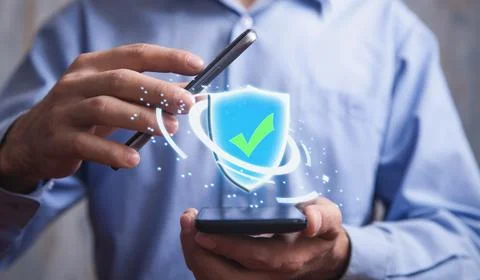 Man showing a shield icon. Web security Stock Photos