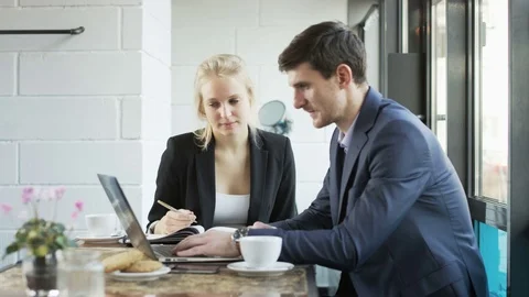 Man is Showing Something on His Laptop Computer Stock Footage 71036273