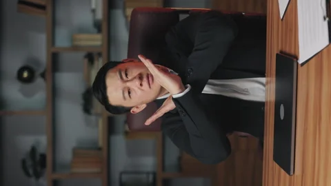 Man showing stop gesture after shutting off device at work Stock Footage 246734252