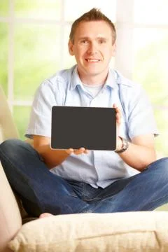Man showing tablet Stock Photos