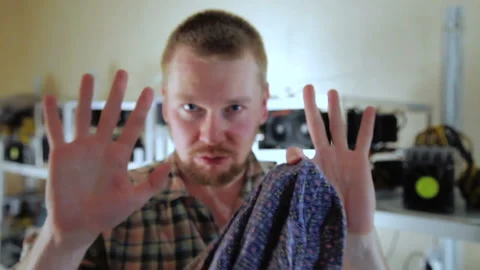 Man showing trick with bitcoin Stock Footage 87044806