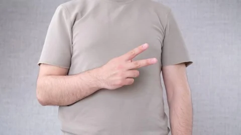 Man showing two finger sign Vídeo Stock 277692893