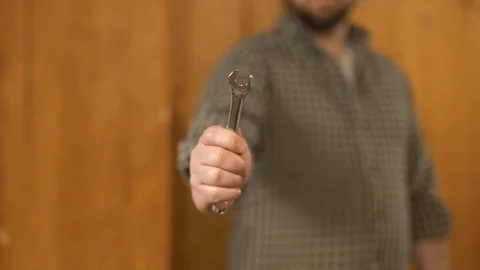 Man showing work tools Stock Footage 120997452