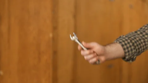 Man showing work tools Stock Footage 120997564