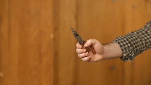 Man showing work tools Stock Footage 120998053
