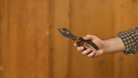 Man showing work tools Stock Footage 120998094
