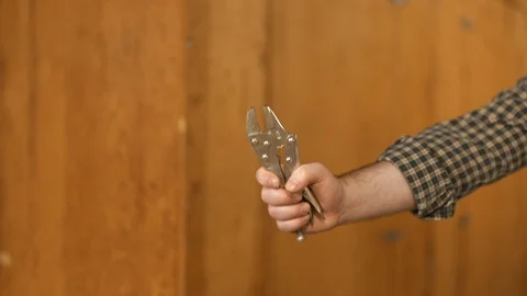 Man showing work tools Stock Footage 120998150