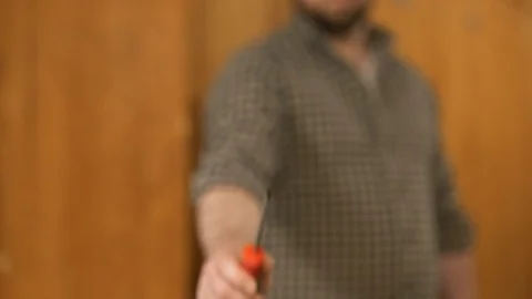 Man showing work tools Stock Footage 120999102