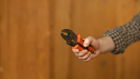 Man showing work tools Stock Footage 120999221