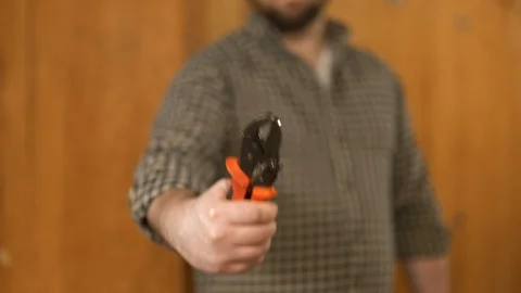 Man showing work tools Stock Footage 120999521