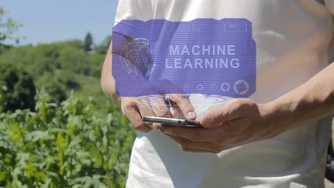 Man shows concept hologram Machine Learning on his phone Stock Footage 102015755