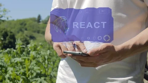 Man shows concept hologram React on his phone Video stock 98973636