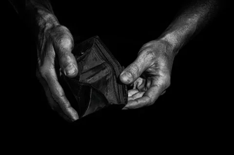Man shows an empty purse. Stock Photos