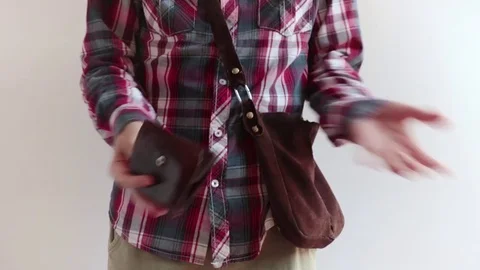 Man shows an empty wallet Stock Footage 75899529