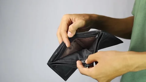 A man shows an empty wallet. Stock Footage 306239447