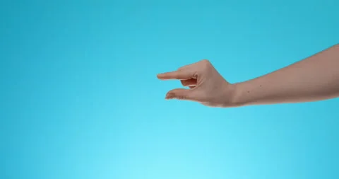 The man shows with a gesture a small size. Stock Footage 146765526