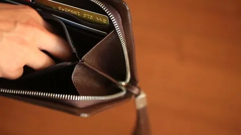 Man shows her empty wallet. Bankruptcy. Bankruptcy - Person holding an empty Stock Footage 77146724