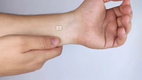 The man shows his hand with a chip implanted. The concept of chipping and implan Video stock 140716506