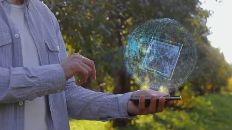 Man shows hologram with computer processor Stock Footage 116130020