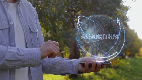 Man shows hologram with text Algorithm Stock Footage 104672143