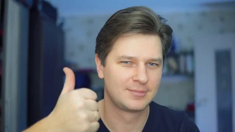 The man shows the likes. Stock Footage 84566964