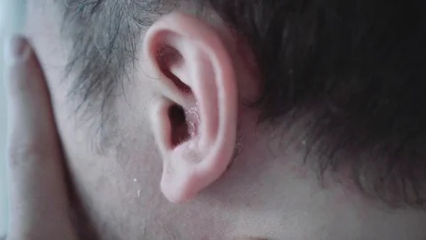 Man shows psoriasis behind the ear Stock Footage 101749590